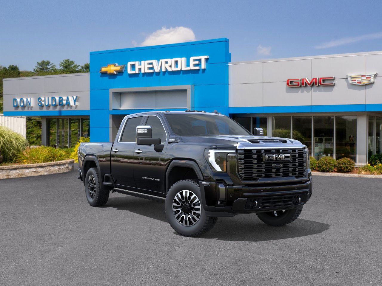2026 GMC Sierra 2500 HD Denali Ultimate in Onyx Black — front three-quarter view